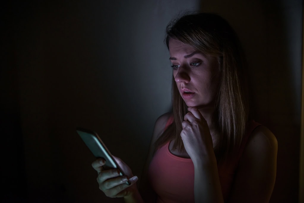 Sad News Upset Young Woman With Mobile Phone